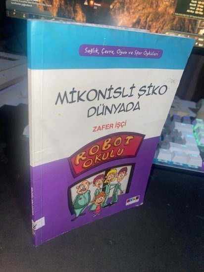 MİKONİSLİ ŞİKO DÜNYA'DA - SAĞLIK ÇEVRE OYUN VE SPOR ÖYKÜLERİ - ZAFER İŞÇİ kitap kapağı