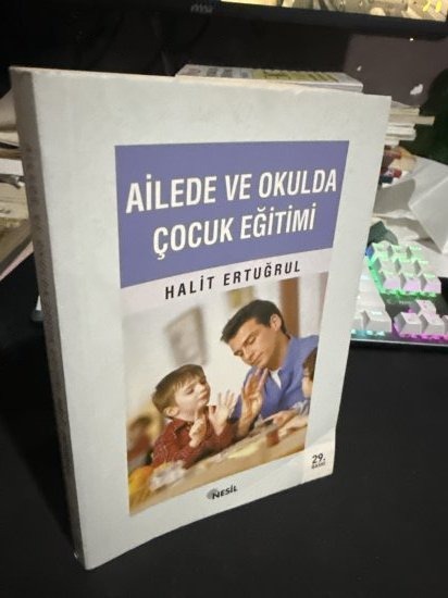 AİLEDE VE OKULDA ÇOCUK EĞİTİMİ - Halit Ertuğrul kitap kapağı